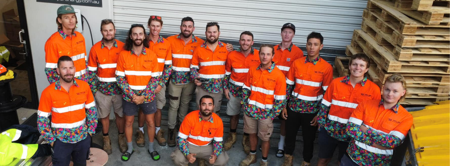 The Taylor Energy team of licensed electricians in branded hi-vis at the warehouse